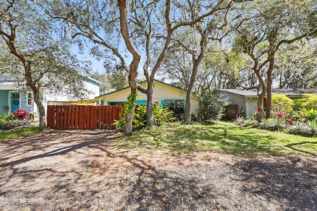 view of front of home with fence