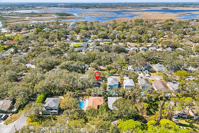 birds eye view of property featuring a water view and a residential view