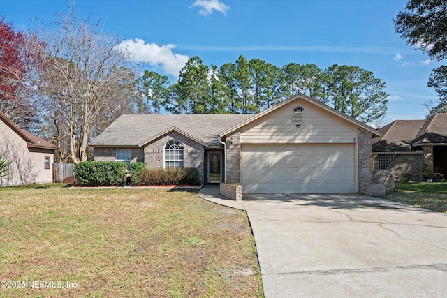 ranch-style home with concrete driveway, a front lawn, an attached garage, and brick siding