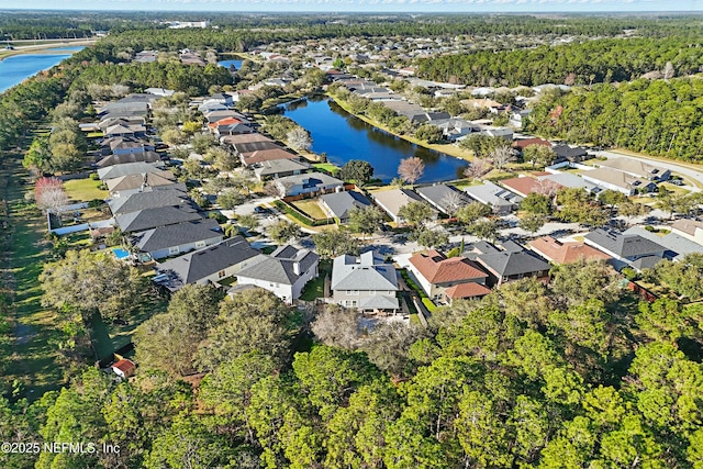 aerial view with a residential view and a water view