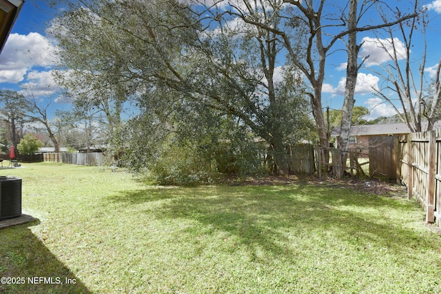 view of yard featuring a fenced backyard and cooling unit