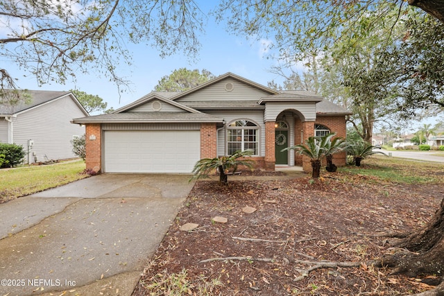 ranch-style house with a garage, concrete driveway, brick siding, and a shingled roof