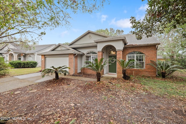 view of front facade with concrete driveway, brick siding, and an attached garage