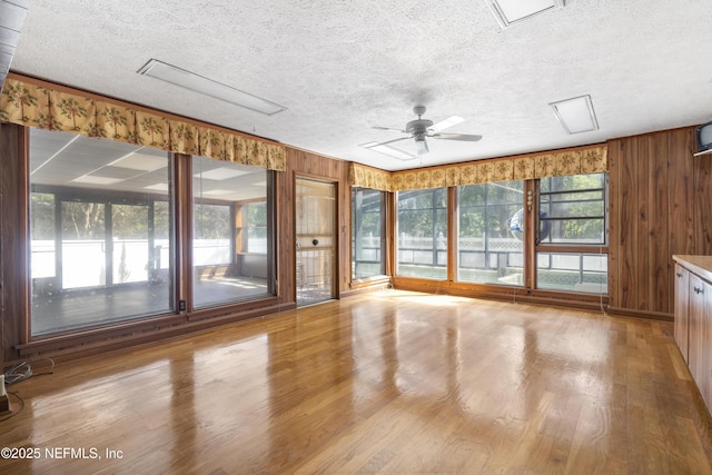 interior space featuring ceiling fan