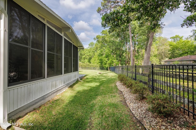 view of yard featuring fence