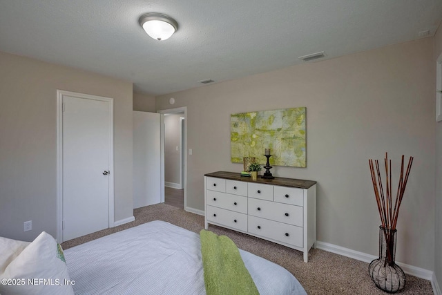 bedroom featuring light carpet, visible vents, and baseboards