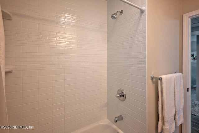 full bathroom with shower / tub combination