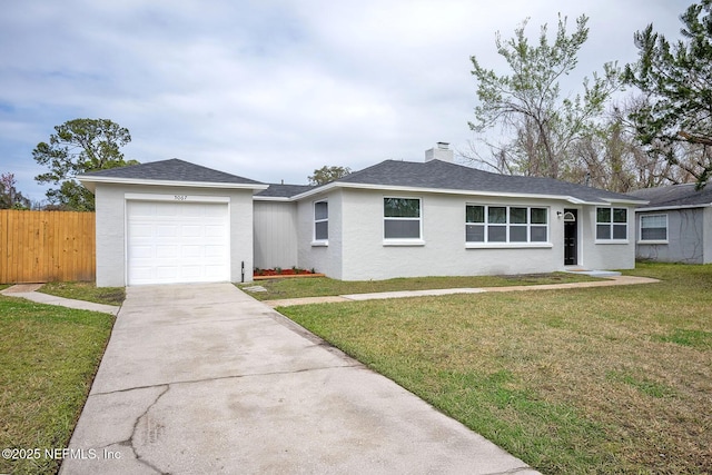 ranch-style house with a garage, concrete driveway, fence, a front yard, and stucco siding