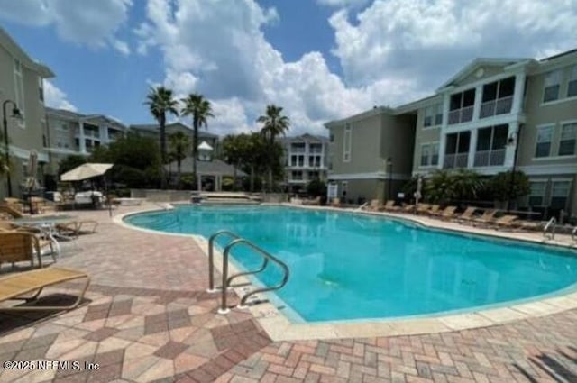 pool with a patio