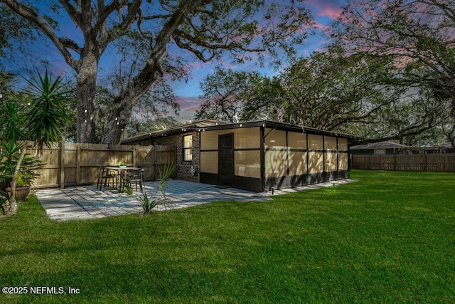 view of outdoor structure featuring a fenced backyard