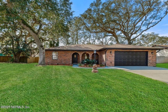 ranch-style house featuring a garage, brick siding, fence, driveway, and a front yard