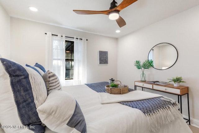 bedroom with ceiling fan and recessed lighting