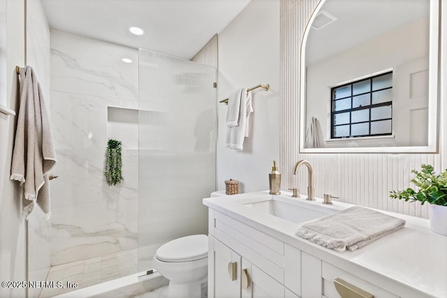 bathroom with toilet, recessed lighting, visible vents, vanity, and a marble finish shower