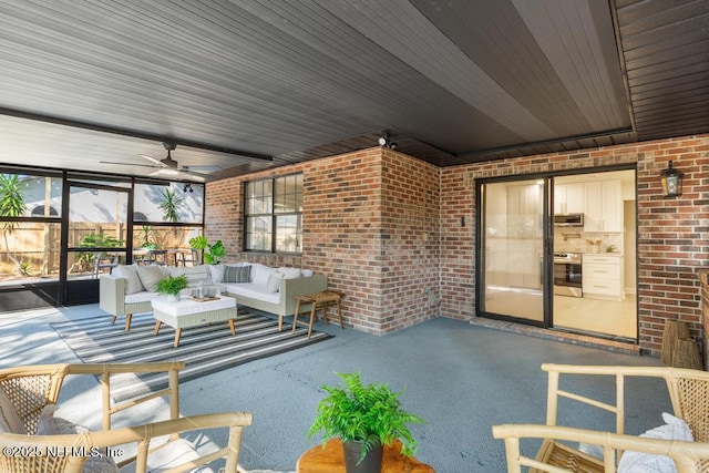 view of patio / terrace with a ceiling fan and an outdoor hangout area