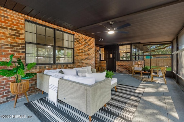 view of patio / terrace featuring a ceiling fan, fence, and an outdoor hangout area