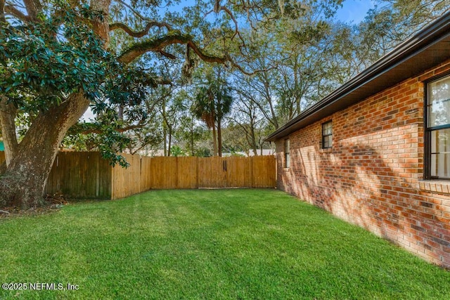 view of yard with fence