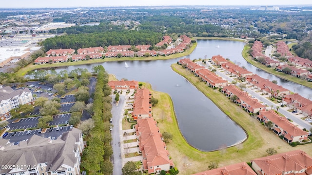 aerial view with a water view and a residential view