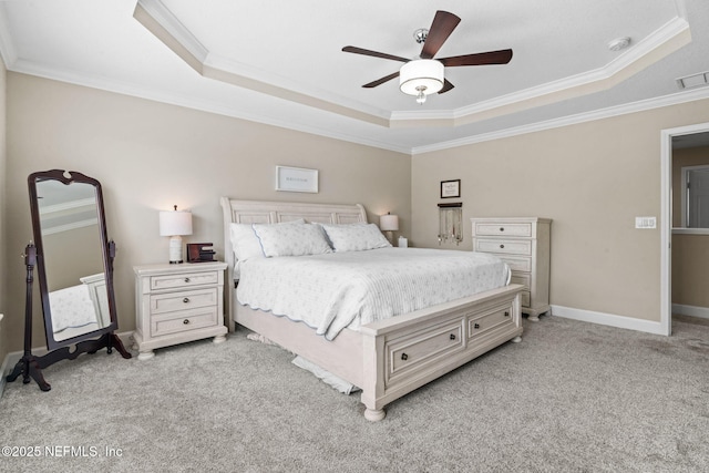 bedroom featuring a raised ceiling, visible vents, and light colored carpet