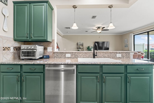 kitchen with a sink, visible vents, dishwasher, and ornamental molding