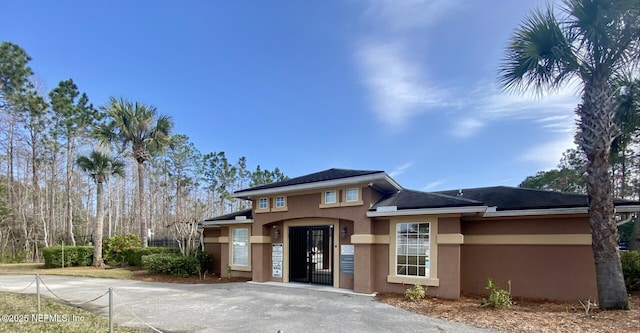 prairie-style house with stucco siding