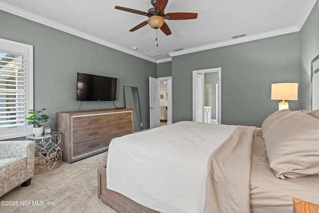 bedroom featuring a ceiling fan, visible vents, crown molding, and light carpet