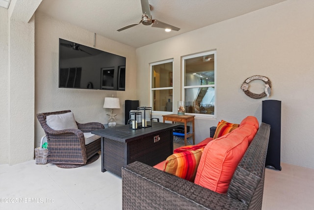 view of patio featuring a ceiling fan and an outdoor hangout area