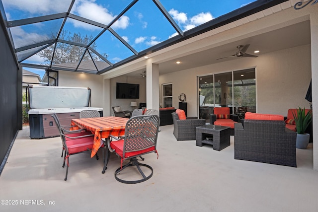 view of patio / terrace featuring outdoor dining area, glass enclosure, an outdoor living space, and a ceiling fan