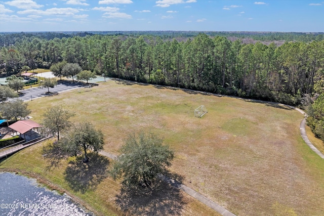 aerial view featuring a view of trees