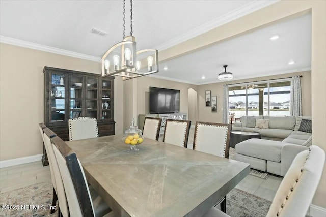 dining area with recessed lighting, visible vents, baseboards, ornamental molding, and an inviting chandelier