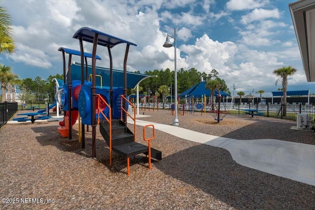 community playground featuring fence