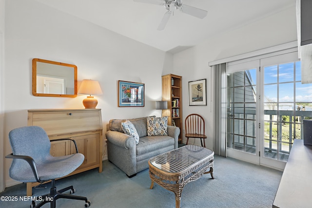 interior space featuring carpet floors and ceiling fan