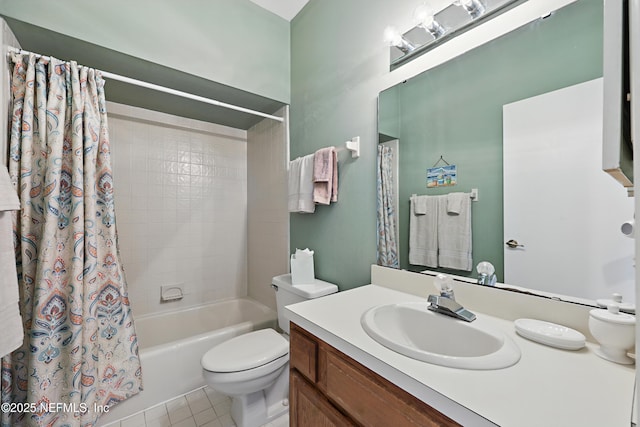 full bath with toilet, tile patterned floors, shower / bath combination with curtain, and vanity