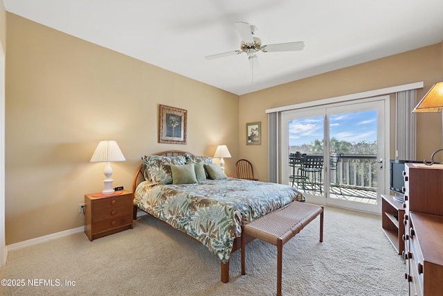 carpeted bedroom featuring access to outside, baseboards, and a ceiling fan