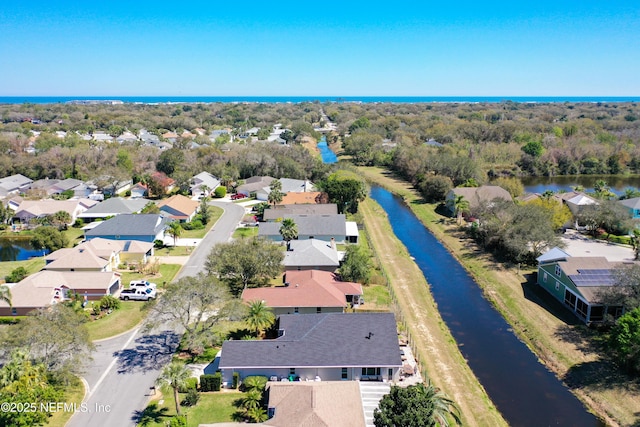 aerial view with a residential view and a water view