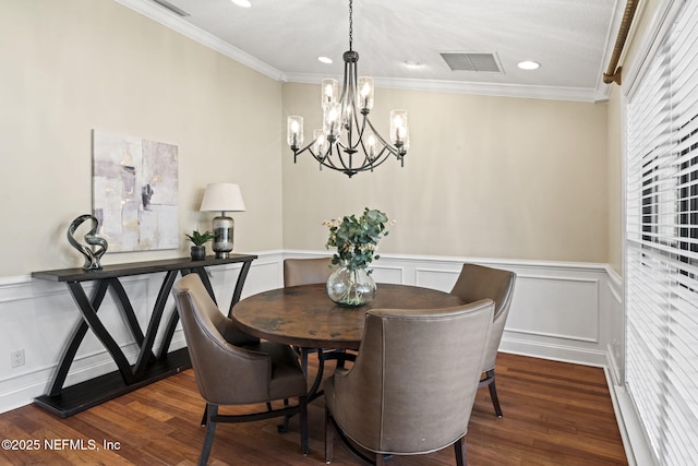 dining room featuring crown molding, visible vents, and dark wood-type flooring