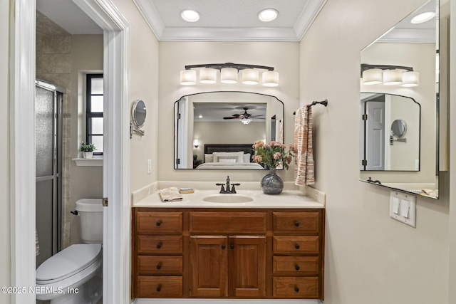 full bathroom with toilet, ornamental molding, a shower stall, ensuite bath, and vanity