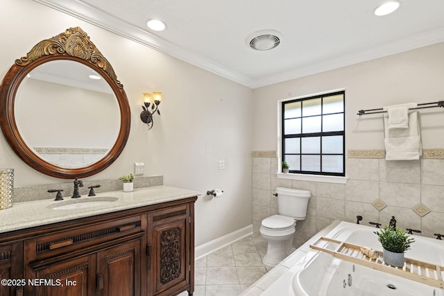 full bathroom featuring toilet, visible vents, vanity, tile patterned floors, and a whirlpool tub