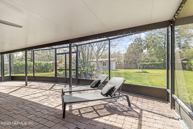 unfurnished sunroom featuring plenty of natural light