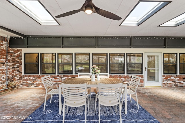 view of patio with ceiling fan and outdoor dining space