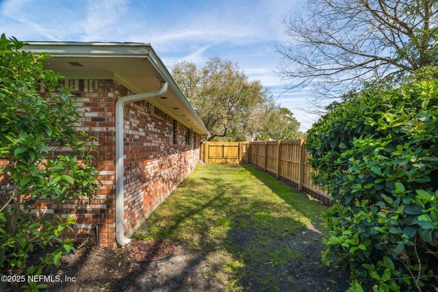 view of yard featuring a fenced backyard