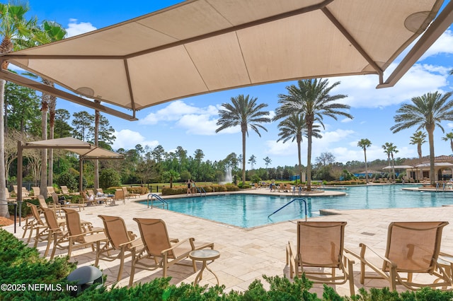 community pool featuring a patio