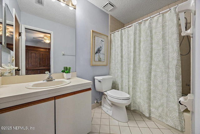 full bathroom with a textured ceiling, toilet, tile patterned flooring, and visible vents