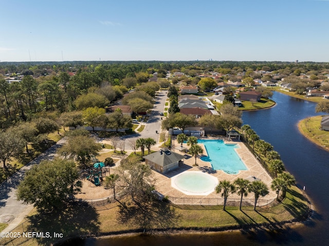 drone / aerial view with a water view