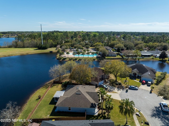 drone / aerial view with a water view