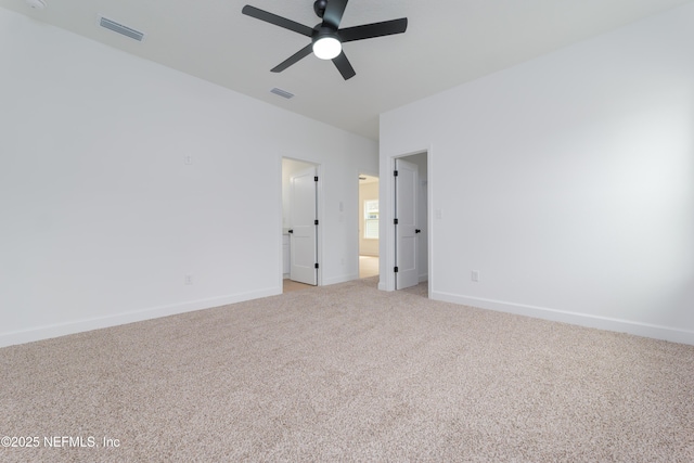 unfurnished bedroom with light carpet, ceiling fan, visible vents, and baseboards