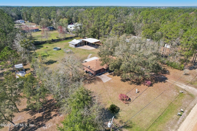 drone / aerial view with a forest view