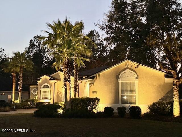 mediterranean / spanish-style house featuring stucco siding