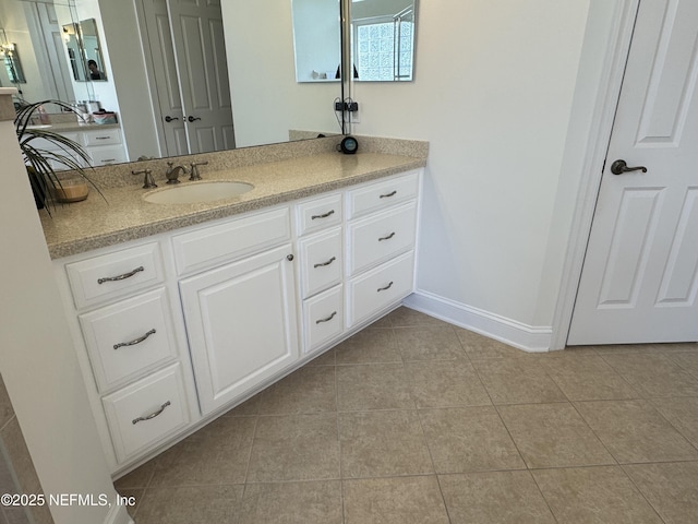 243 Stonewell Dr, Saint Johns, FL 32259 - bathroom with tile patterned floors and vanity