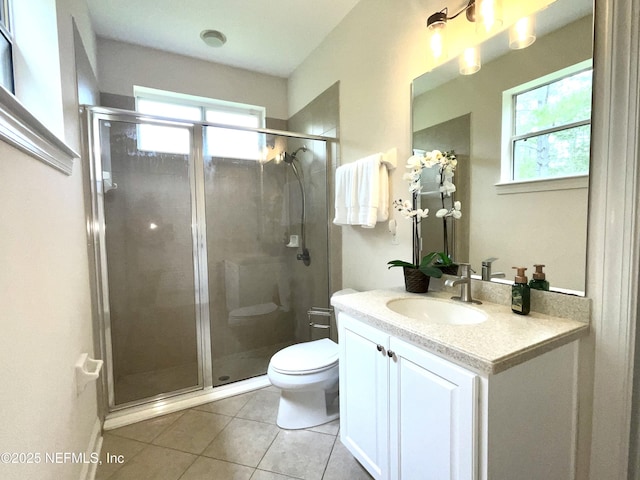 243 Stonewell Dr, Saint Johns, FL 32259 - bathroom with vanity, tile patterned floors, healthy amount of natural light, and a stall shower