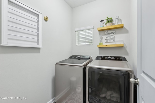 clothes washing area featuring laundry area and independent washer and dryer